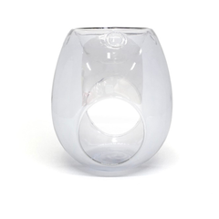 A clear glass vessel with a rounded, hourglass-like shape and a large circular cutout on the front, shown on a white background.